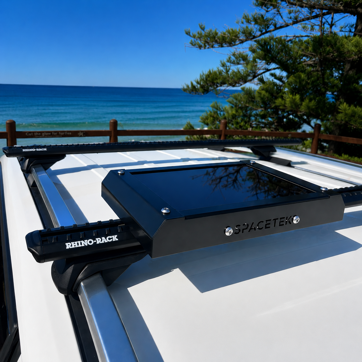 Spacetek Stealth Mount for Starlink Mini installed on a single Rhino-Rack crossbar, featuring a low-profile black aluminium design for secure vehicle-mounted satellite internet connectivity.