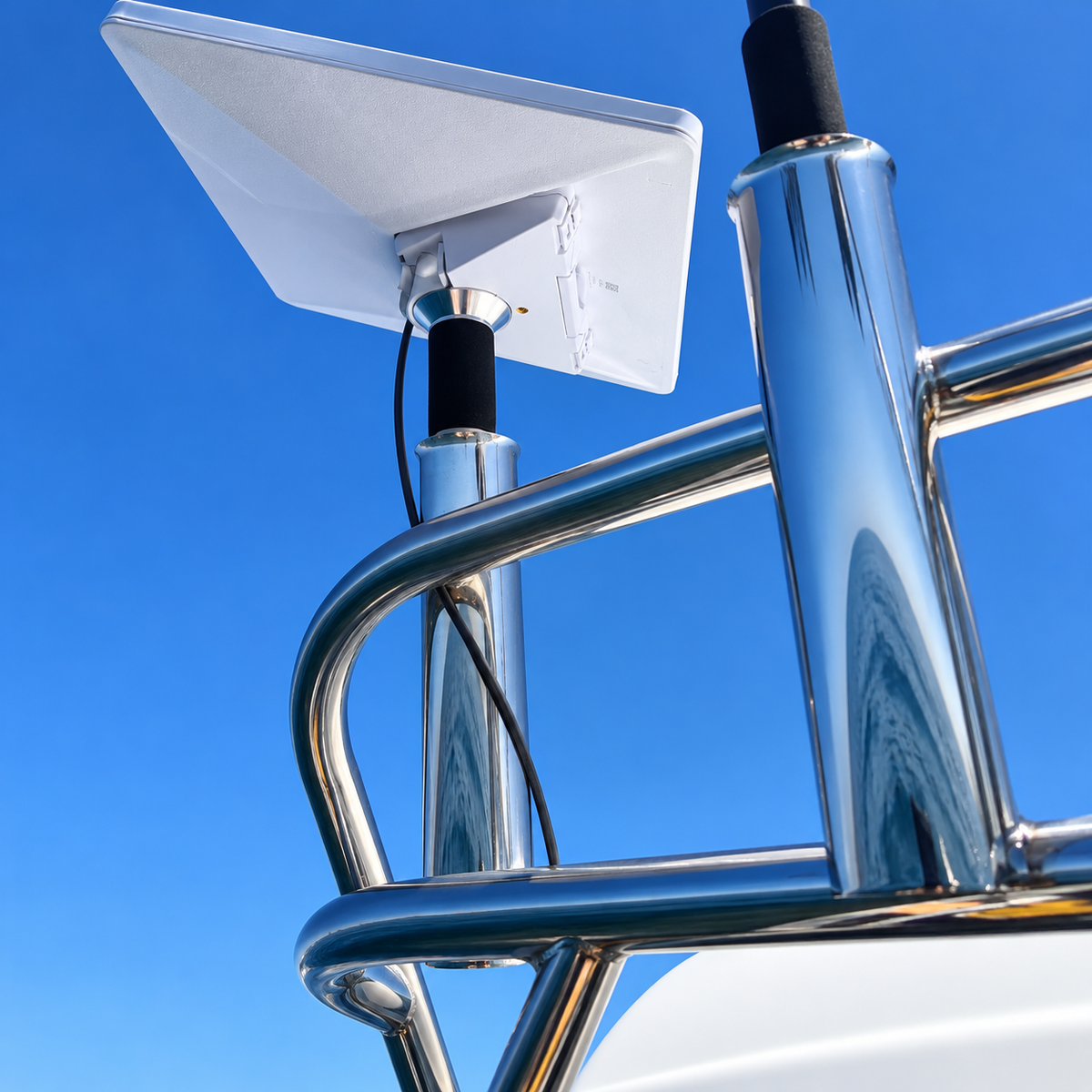 Starlink Mini mounted on a stainless steel rod holder on a boat using the Spacetek Starlink Mini Stainless Steel Rod Holder
