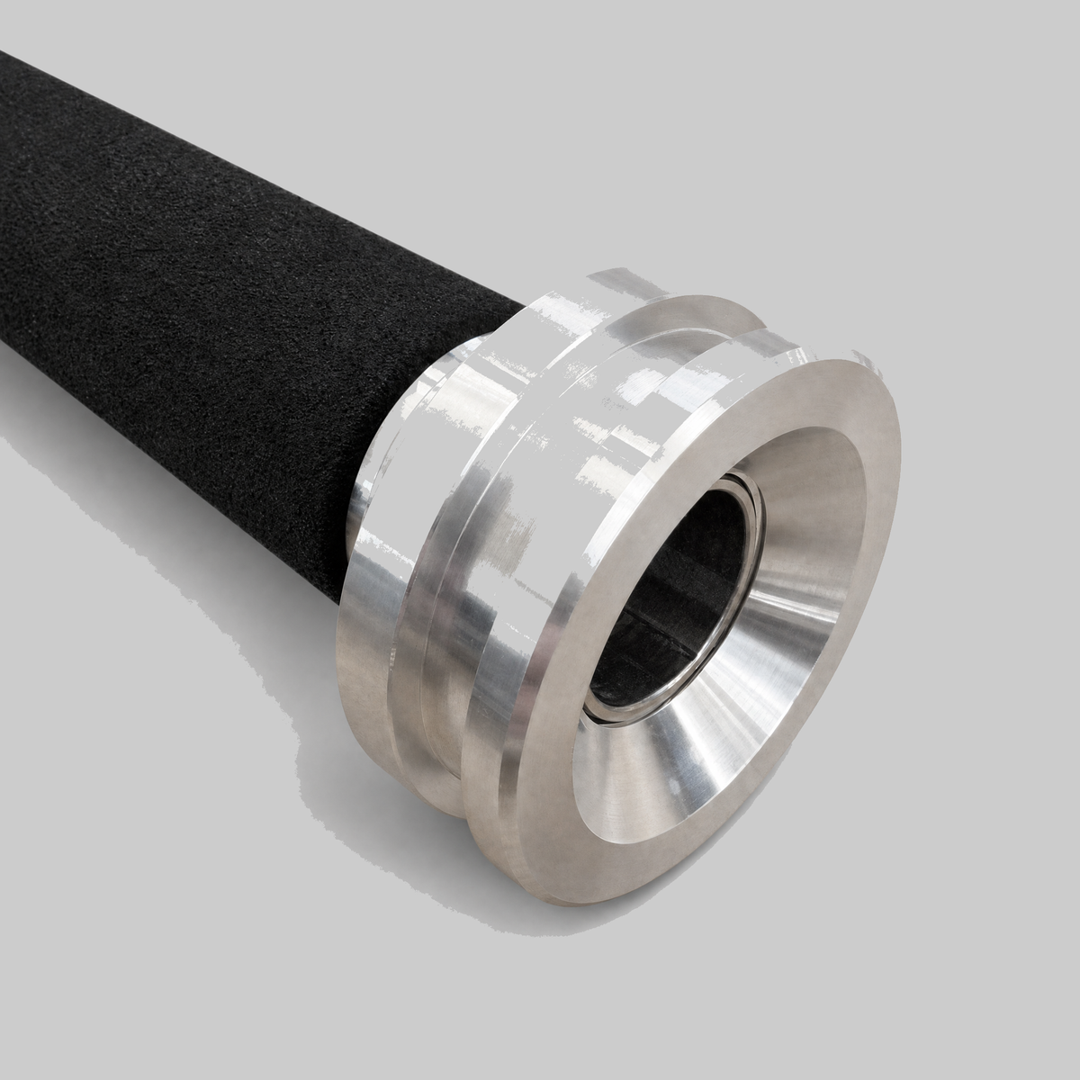 Close-up of machined stainless steel collar and black sleeve on rod holder pole mount adapter