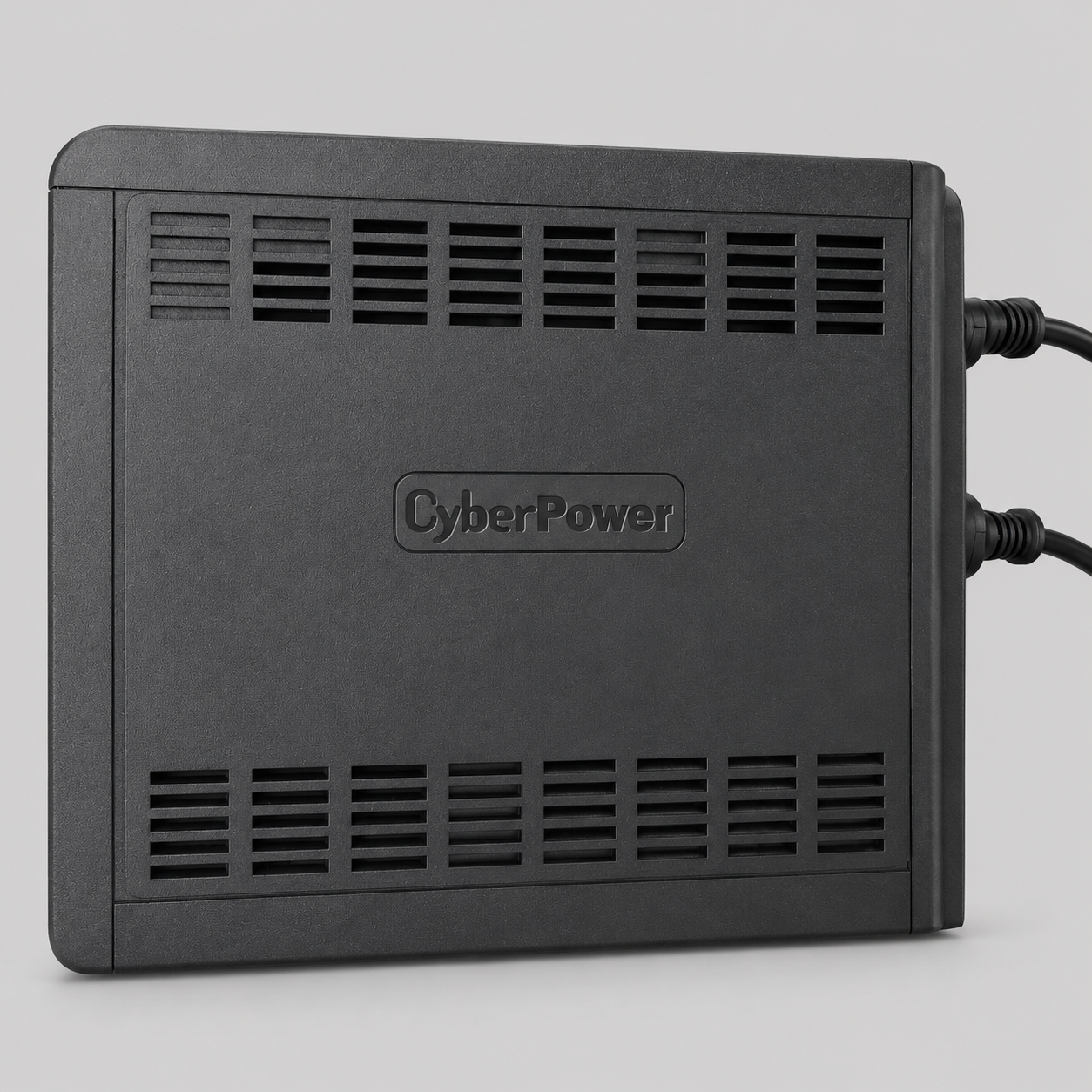 Side profile of a CyberPower UPS  for Starlink , highlighting the ventilation grilles, embossed logo, and connected power cables against a light grey background.