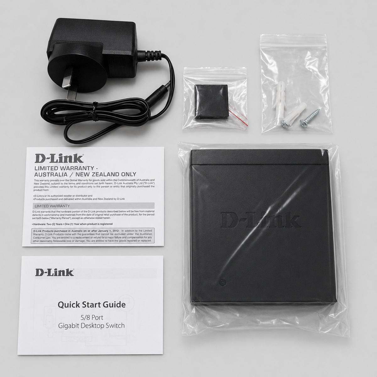 D-Link DGS-105 unmanaged 5 port switch with power adapter, mounting hardware and manuals for Starlink expansion