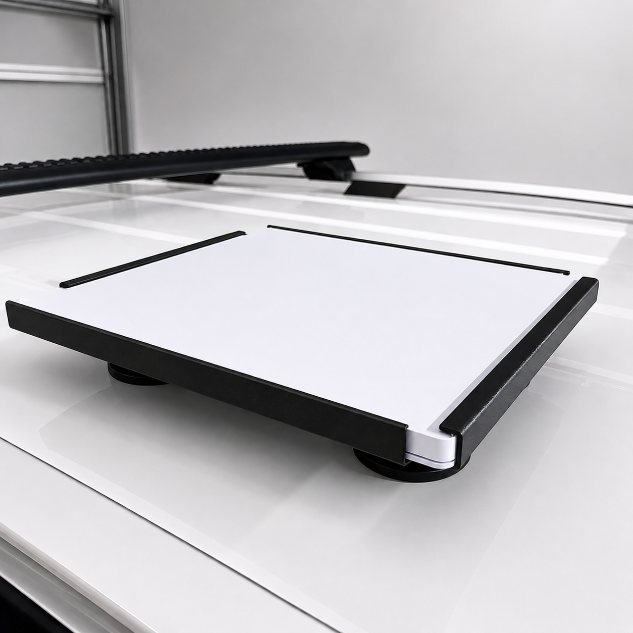 Starlink Mini Vehicle Magnet Mount installed on a vehicle roof with carbon steel construction and four 65mm (2.5 inch) magnets for secure mounting.